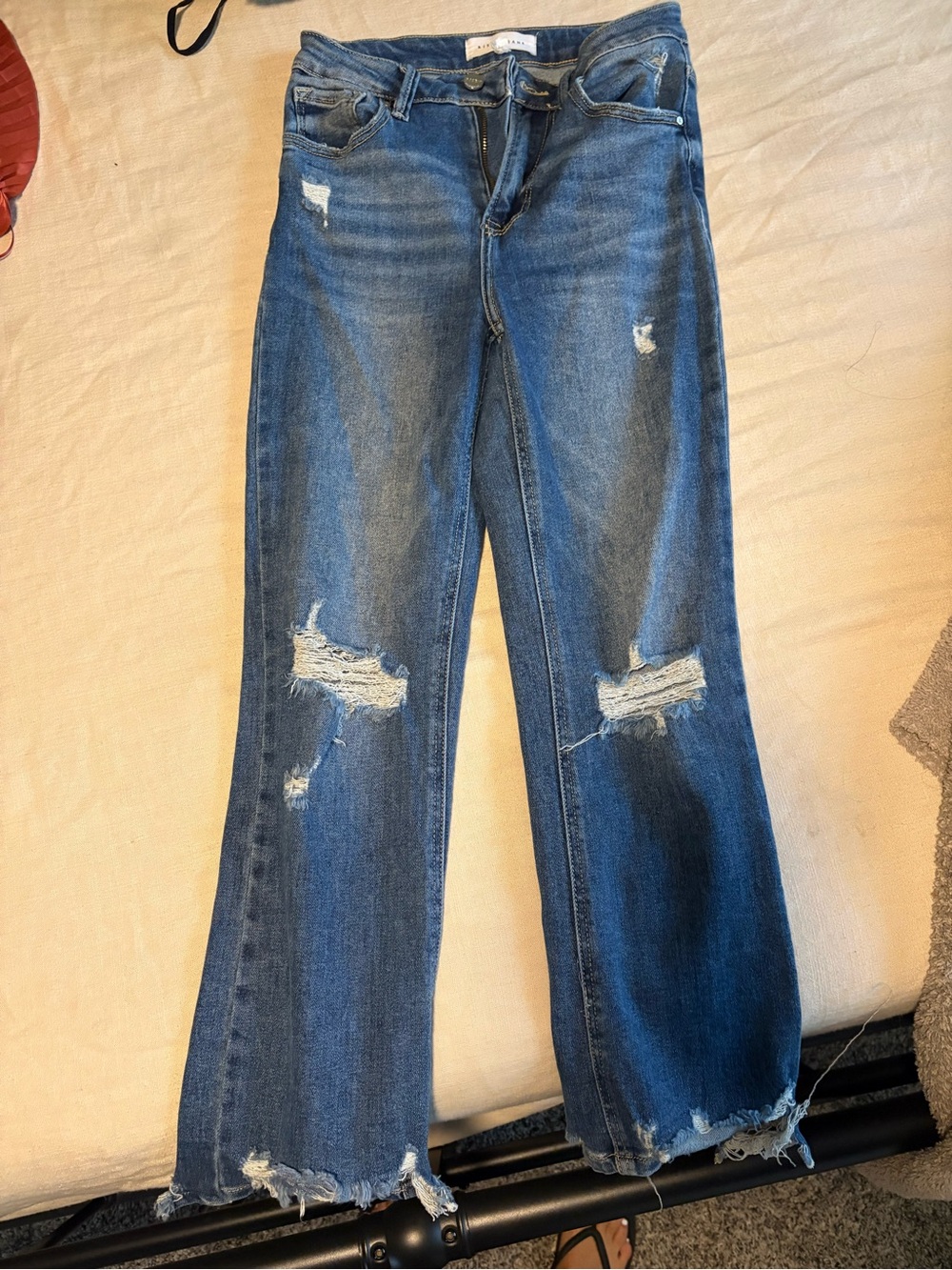 Women’s Risen Distressed Blue Jeans